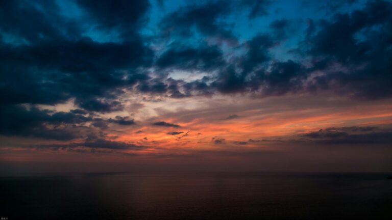 painting of black cloud during sunset